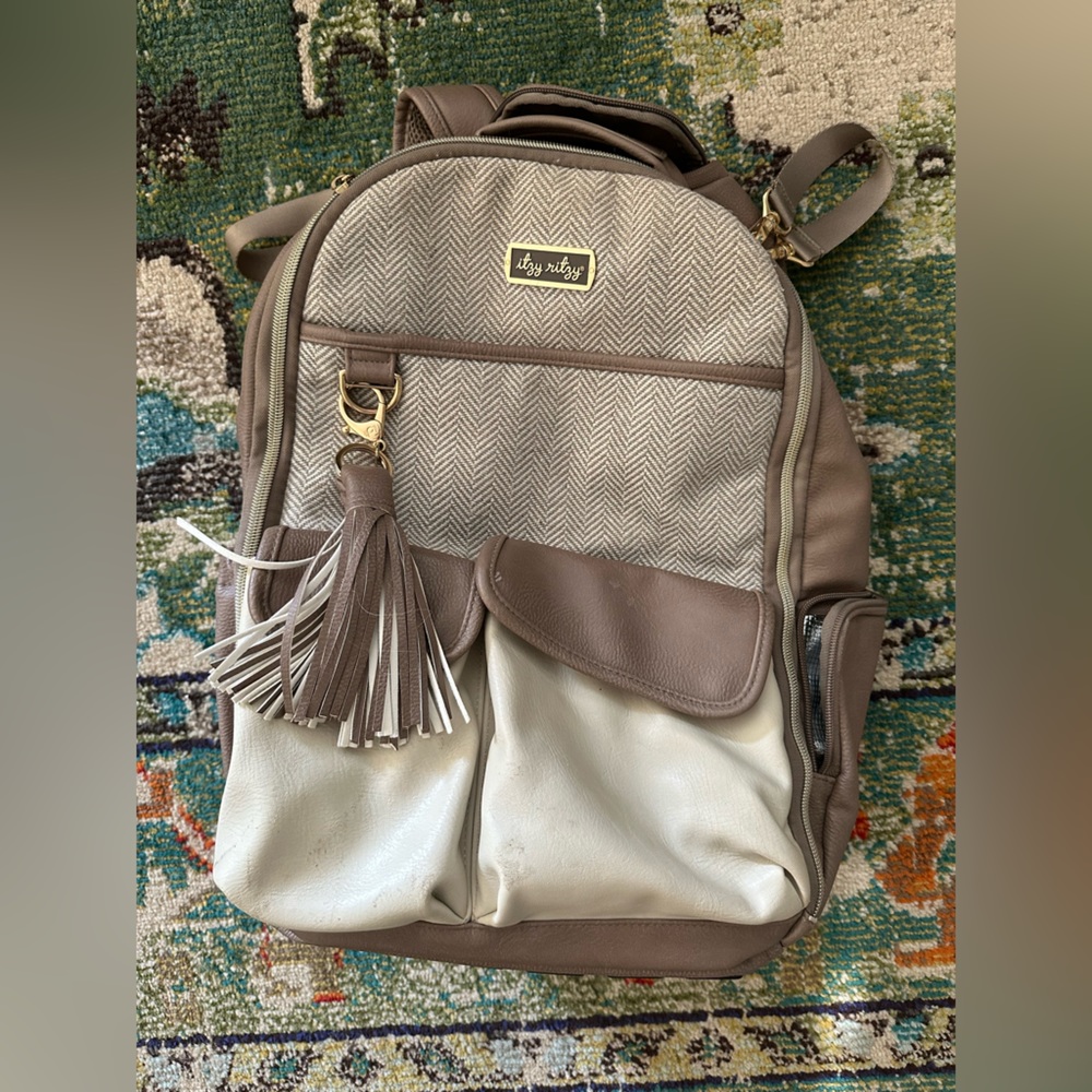 Itzy Ritzy diaper bag with changing pad